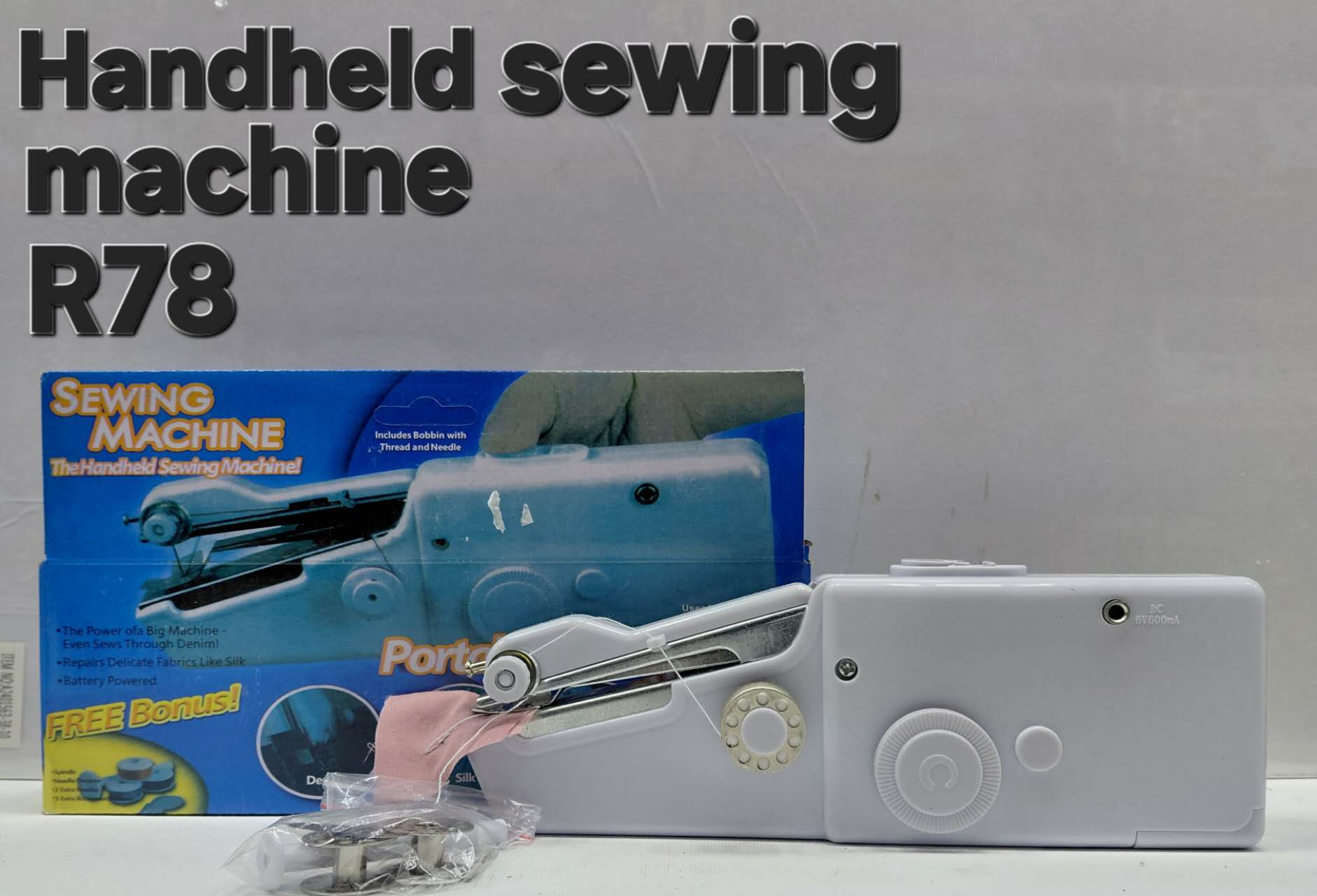 Handheld sewing machine